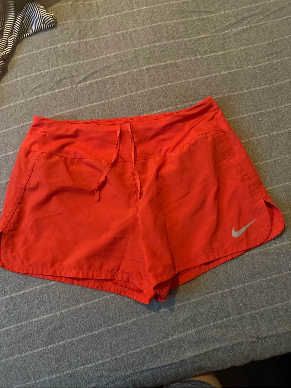 Nike Women’s Red Athletic Running Shorts with Reflective Swoosh